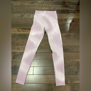 Purple and white leggings